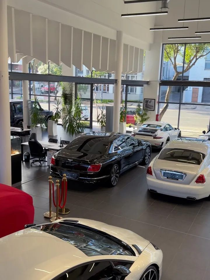 Inside the Aksons Umhlanga showroom: a Bentley, a Rolls-Royce and a Lamborghini on the floor
